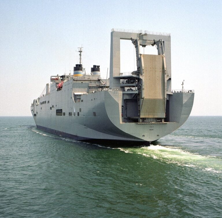MV Gordon cargo ship sailing on the water with a clear sky.